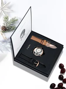Vue détaillée du coffret cadeau montre TOMI avec deux bracelets en cuir interchangeables en boîte