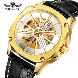 Gros plan de la montre automatique T-WINNER pour homme avec boîtier doré et cadran squelette