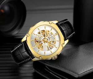 Détail de la montre automatique squelette T-WINNER pour homme en or