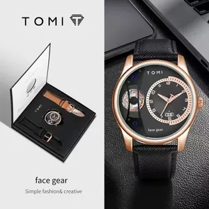 Coffret montre homme TOMI minimaliste avec bracelets en cuir noir et marron interchangeables.