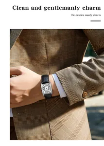 Close-up of a classic square quartz watch with Roman numerals on a leather strap.