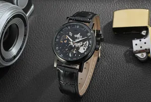 Detail of T-Winner skeleton mechanical watch with black leather strap and Roman numerals