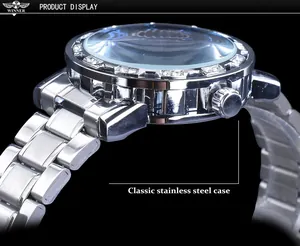 Detailed macro view of classic silver stainless steel case on manual mechanical watch
