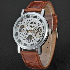 Close-up detail of T-Winner skeleton mechanical watch with textured brown leather strap