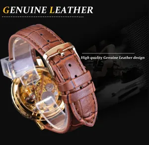 Close-up of brown crocodile embossed genuine leather strap on a skeleton mechanical watch