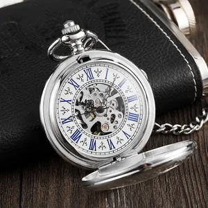 Close-up of silver mechanical pocket watch with blue Roman numerals and skeleton dial