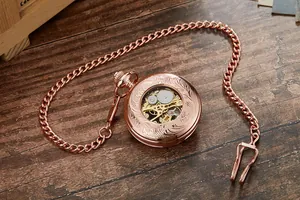 Montre de poche mécanique squelette vintage en or rose avec une gravure très ornée
