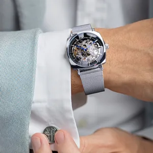 Montre automatique pour homme avec bracelet en maille argentée et cadran squelette