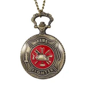 Vintage bronze quartz pocket watch with embossed red Fire Fighter emblem and chain