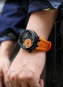 Detailed view of MEGIR 8111 men's fashion skeleton watch with vibrant orange strap
