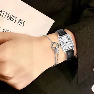 Elegante geschenkset met vintage zilveren rechthoekig horloge en armband voor dames