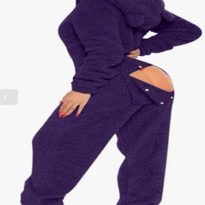 Close-up of purple fuzzy hooded onesie pajamas featuring a functional back flap