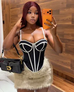 Detail showing the boning and contrast lines of the black sexy corset bustier top