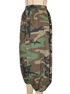 Detail view of casual woodland camouflage printed harem pants with elastic waist.