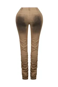 Braune schmal geschnittene Stretchhose mit hoher Taille und Vintage-Waschung...