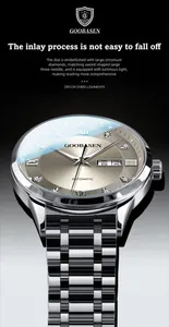Detailed macro shot of a silver Goobasen men's watch with golden sunburst dial and zircon accents