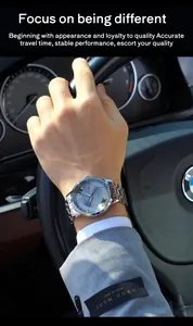 Close-up of Goobasen silver men's watch with diamond markers and date display