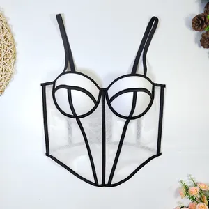 Detail showing the white mesh fabric and black fishbone structure of this sexy corset top.