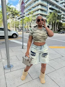 Women's street style distressed ripped patchwork denim five-point shorts in washed light blue