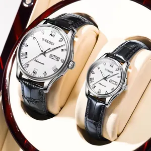 Close-up of GOOBASEN couple watches with silver cases and black leather straps