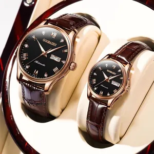 Close-up of Goobasen couple watches with brown leather straps and diamond markers