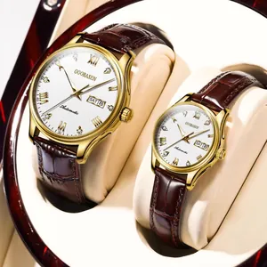 Close-up of Goobasen luxury couple watches with leather straps and automatic movement.
