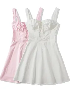Robes trapèze à bretelles taille haute avec nœud en blanc et rose poudré élégantes.