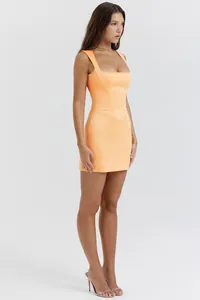 Side view profile of a vibrant orange square-neck bodycon mini dress worn by a model