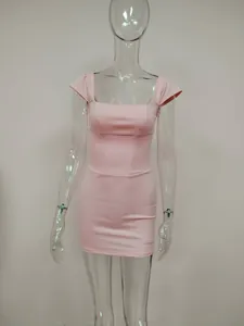 Front view of a sexy light pink bodycon mini dress displayed on a clear mannequin.