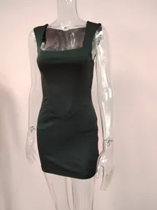 Sexy dark green bodycon mini dress with elegant square neck on mannequin display.
