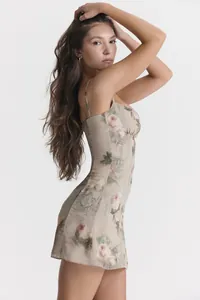 Side view of vintage floral print mini slip dress with padded bust and thin straps