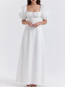 Elegant white puff sleeve maxi dress featuring a square neckline and flowy silhouette