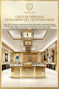 Elegant interior view of luxury Goobasen watch boutique featuring gold decor and displays