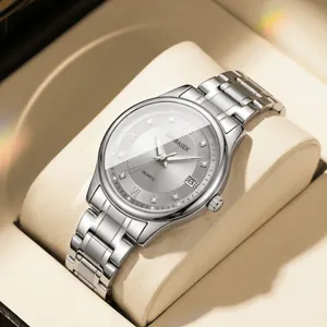 Elegant GOOBASEN ladies silver quartz watch with calendar window and metal link strap