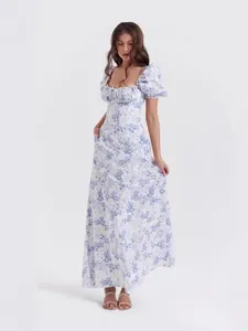 Elegant blue floral maxi dress with puff sleeves and cinched bust in vintage sweet style