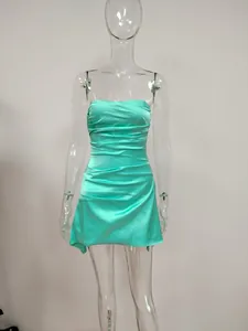 Detailed view of mint green ruched strapless satin mini dress with fishbone structure