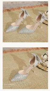 Detail view of silver sequin bridal heels with pearl ankle strap and bow