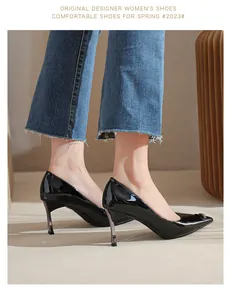 Elegant black patent leather pointed-toe high heels for women showing side profile