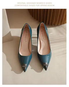 Elegant teal patent leather pointed-toe high heels with metallic rhinestone toe cap