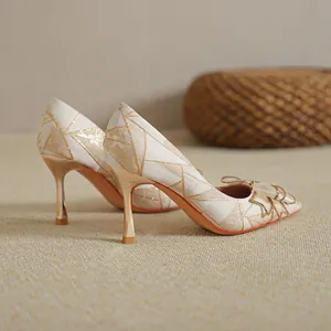 Elegant French stiletto pumps with pointed toe and geometric pattern for weddings