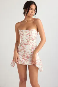 Elegant white floral strapless mini dress featuring bustier detail and corset boning