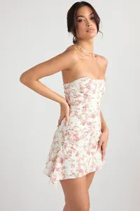 Detailed view of a white strapless corset mini dress featuring a romantic pink rose floral print
