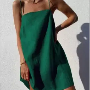 Elegant emerald green spaghetti strap cotton linen mini dress for summer vacation wear