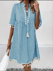 Bohemian blue printed V-neck mini dress featuring chic tassel details and half sleeves