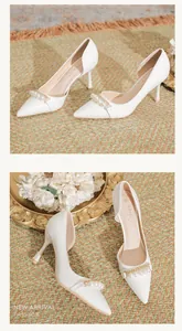 Detail view of white pointed toe pumps with pearl chain strap and side hollow cut