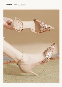 Detail of sparkling nude sequined pointed toe stiletto heels with ankle strap