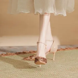 Elegant pointed toe stiletto pumps featuring shimmering sequins and slim ankle straps