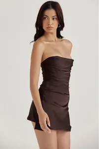 Stunning detailed shot of a dark brown strapless boned corset mini dress for party