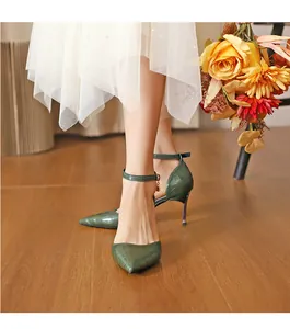 Elegant dark green crocodile pattern pointed toe high heels with ankle strap detail