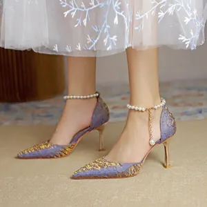 Elegant purple floral high heels with pearl ankle strap and gold stiletto heel